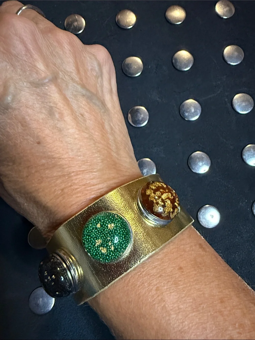Snap Gold-Tone Cuff Bracelet with Green, Black, and Brown Accents